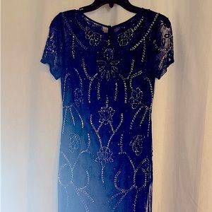 Adriana Pappel beaded, navy blue overlay dress. Flared skirt at bottom. Size six